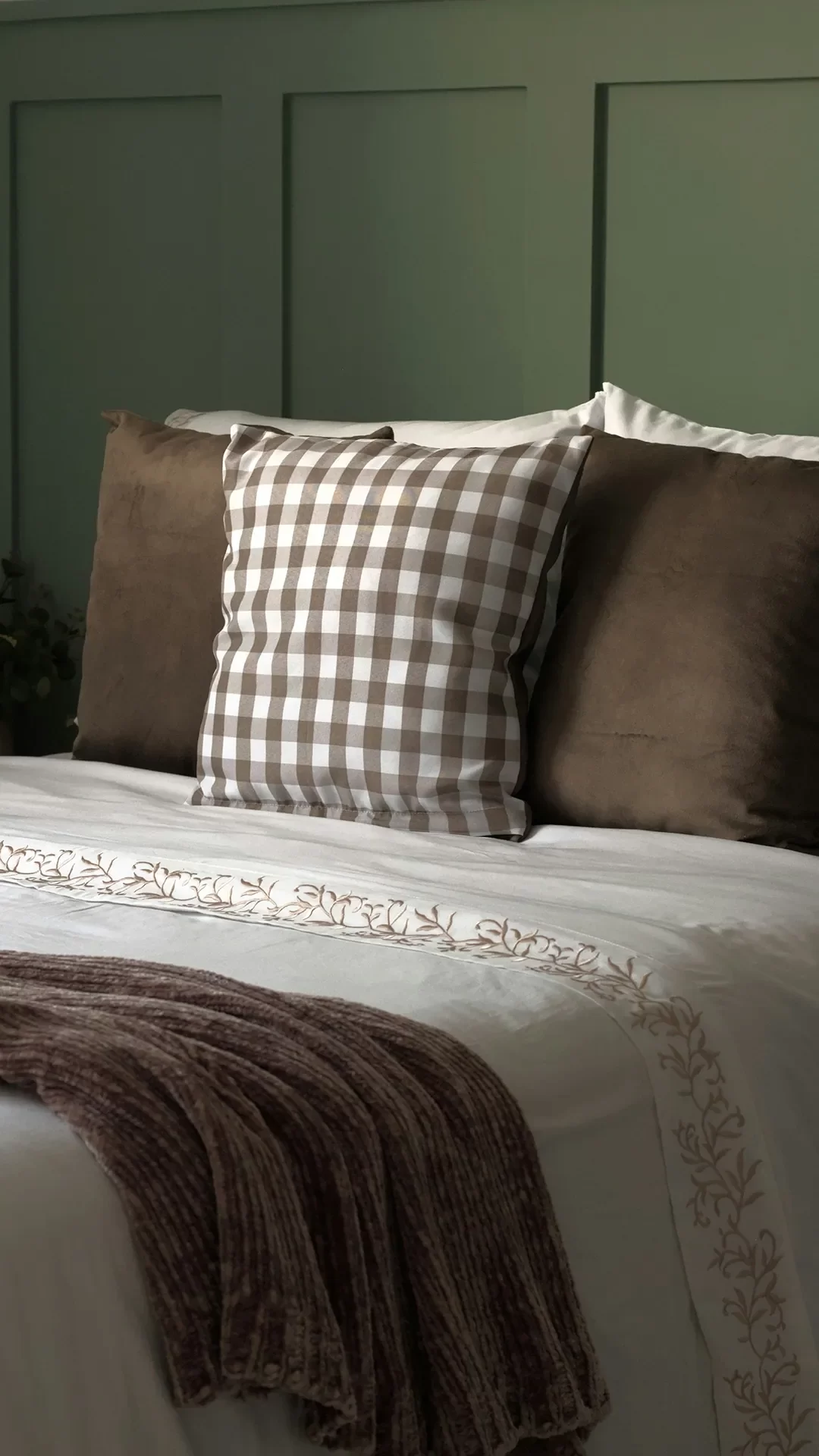 A bedroom shot within a property, showing a large bed.