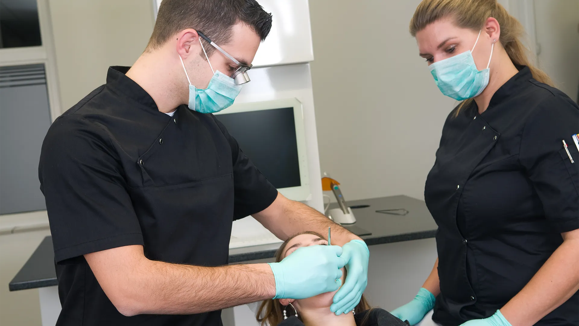 Dentist with a client